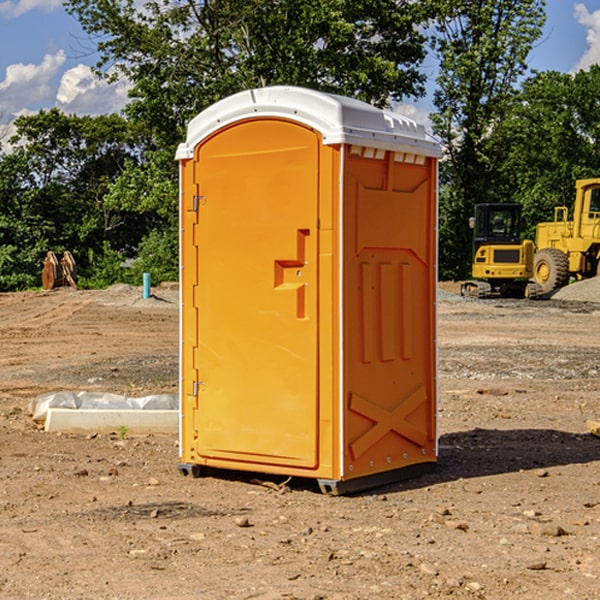 how often are the portable restrooms cleaned and serviced during a rental period in Owanka